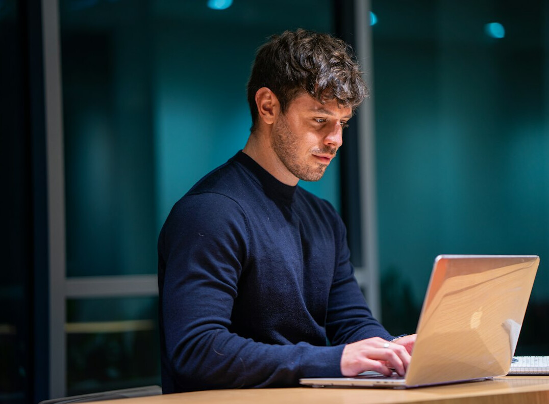 educator using laptop