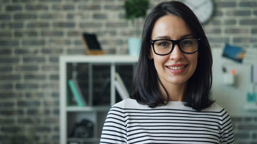 successful online educator smiling